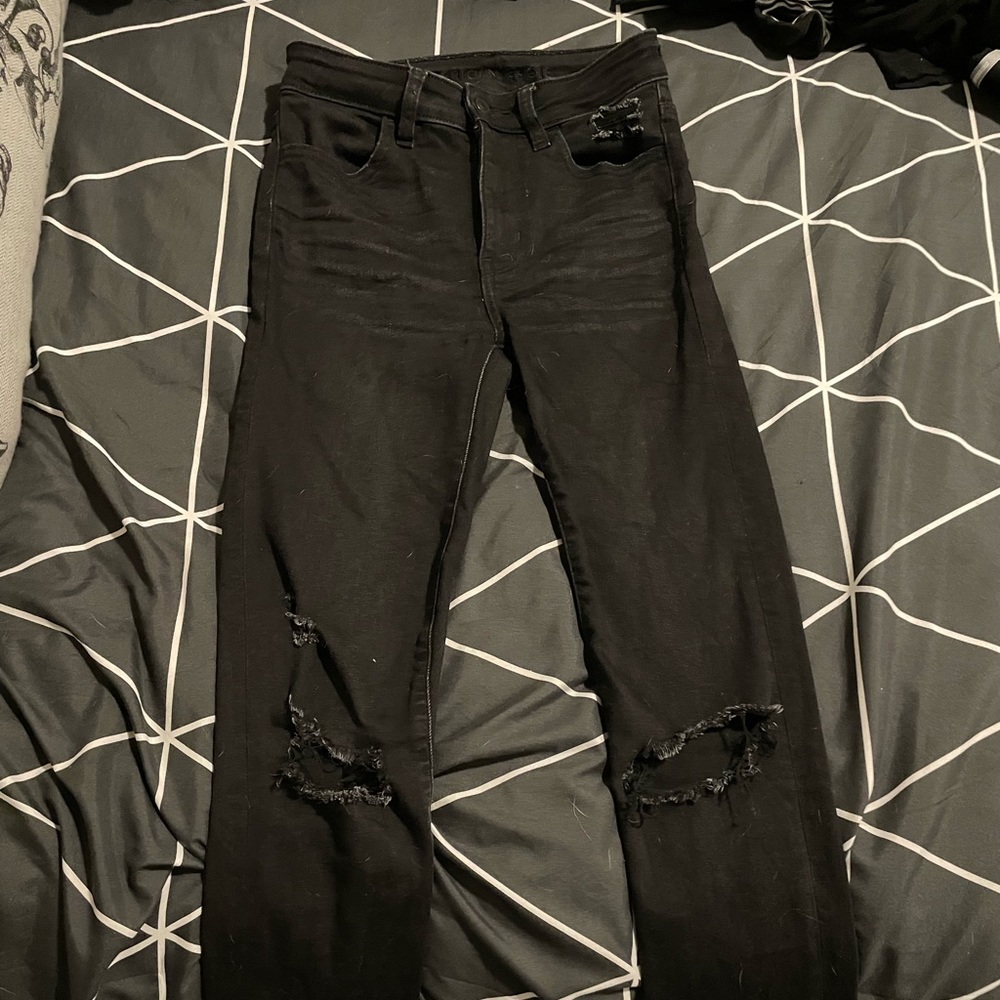 Black ripped skinny jeans